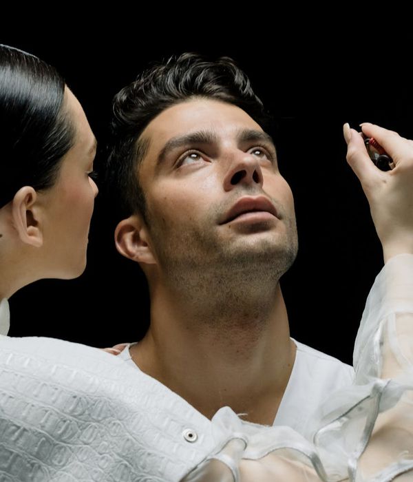 Person practicing eye focus techniques in a modern office